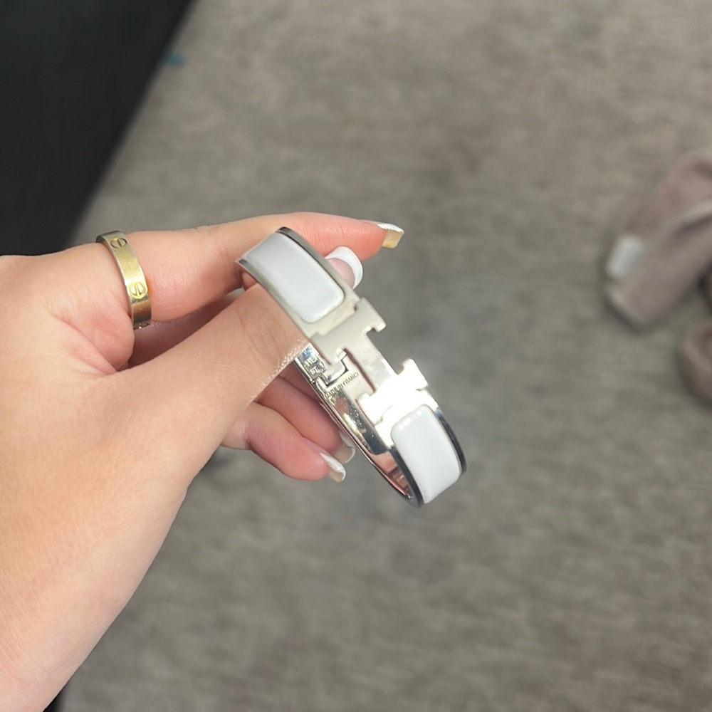 White and white gold Hermes clic H bracelet